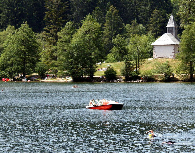 Lake Longemer with the little chapel dedicated to St. Florent.